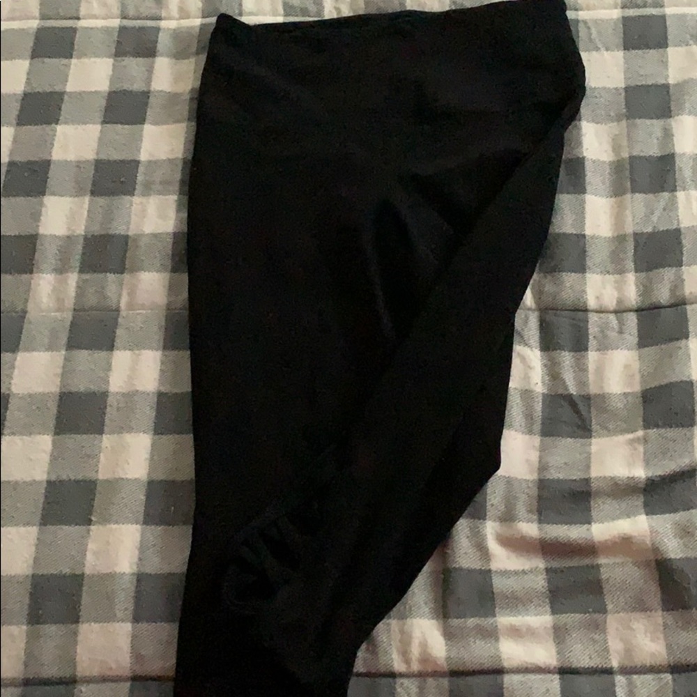 Women’s leggings with design on bottom.